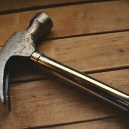 black and silver claw hammer